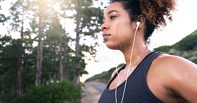 Buy stock photo Woman, runner and earphones in road, thinking and perspective with music, break and fitness training in summer. Girl, reflection and streaming for exercise, workout and sound by forest in Costa Rica