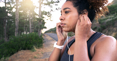 Buy stock photo Girl, runner and earphones in road, nature and perspective with music, break or training for fitness in summer. Woman, reflection and streaming for exercise, workout and path by forest in Costa Rica