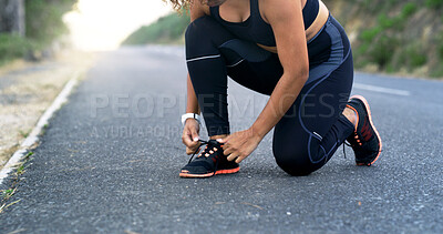 Buy stock photo Hands, runner and shoelace on road, nature and ready for training, workout or fitness for health in summer. Person, shoes and start morning with exercise, wellness or outdoor on asphalt in Costa Rica