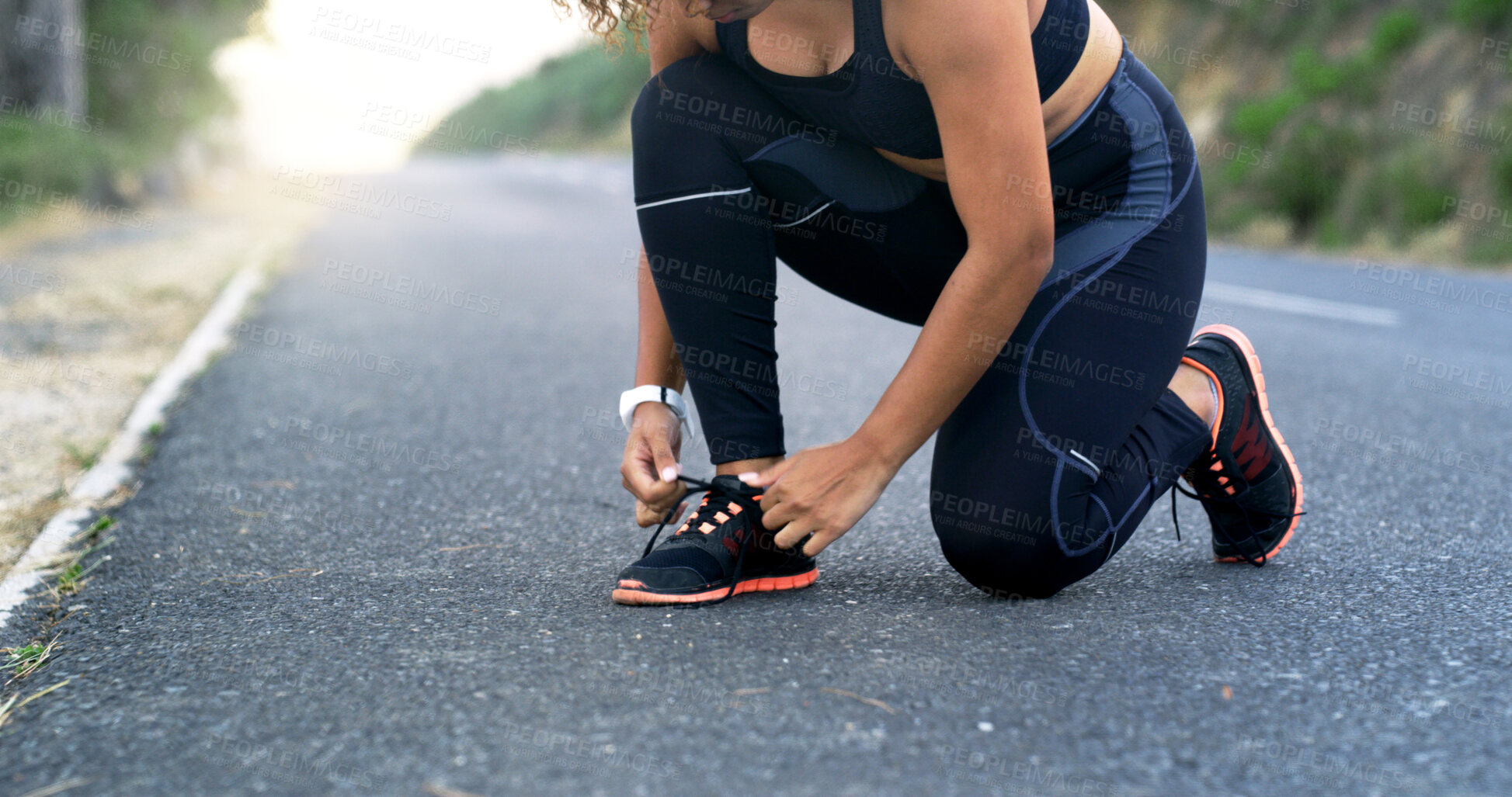 Buy stock photo Hands, runner and shoelace on road, nature and ready for training, workout or fitness for health in summer. Person, shoes and start morning with exercise, wellness or outdoor on asphalt in Costa Rica