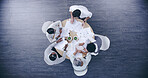 Above, group and business people with paperwork for discussion, meeting and collaboration in office. Teamwork, diversity and brainstorming for project in finance, company and corporate as colleagues