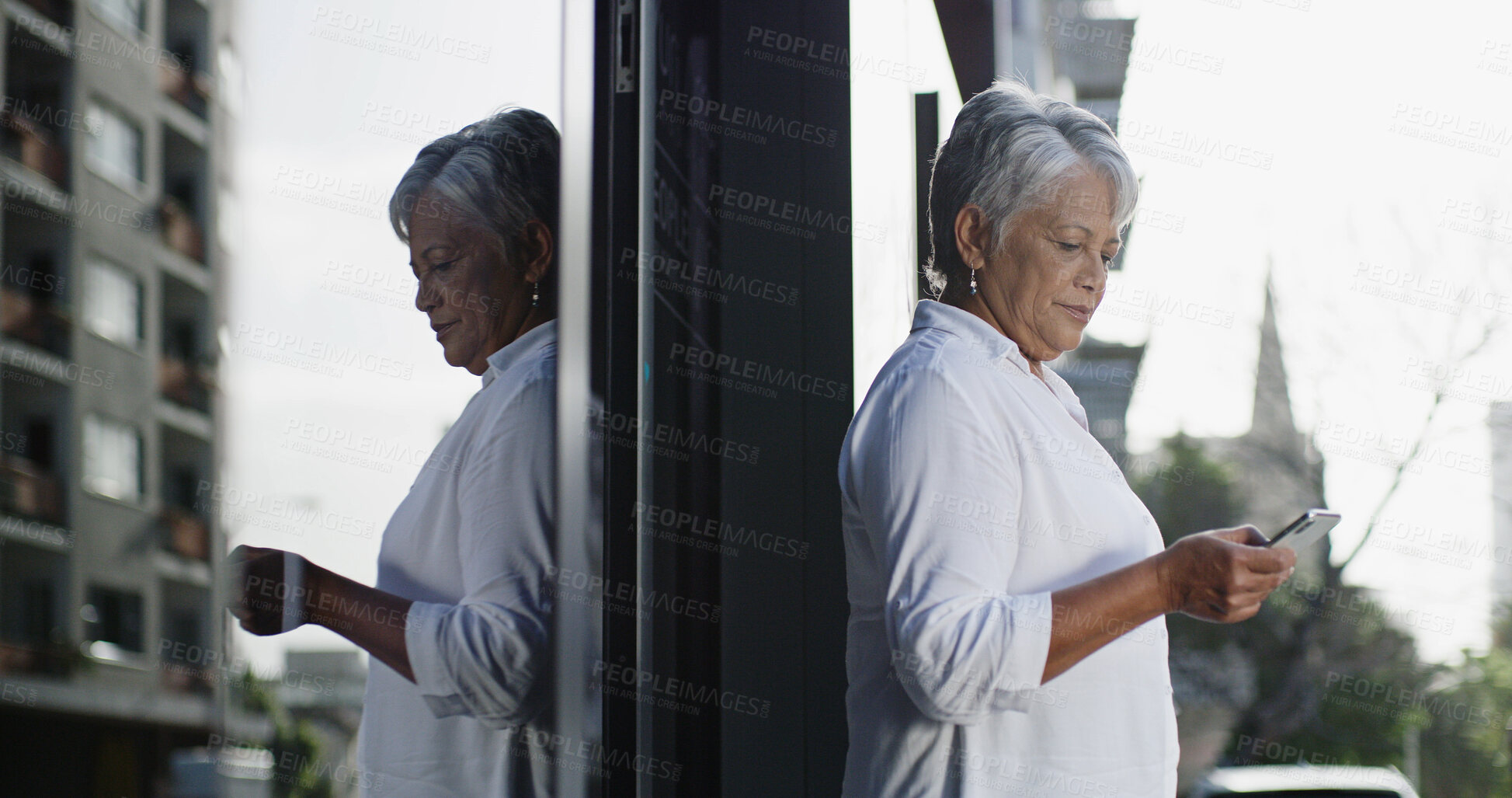 Buy stock photo Business, mature woman and phone in city for text message, checking notification and communication. Professional person, break and reading with smartphone by outdoor building for mobile chat or email