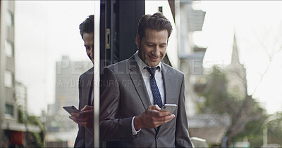 Buy stock photo Business, man and smile with phone in city for text message, checking notification or communication. Professional, person or happy with smartphone by outdoor building for mobile chat or reading email