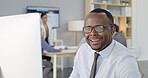 Happy man, glasses and reading on computer for business, budget review and pleases with startup growth in office. Accountant, tech and smile in company for productivity, investment and online banking