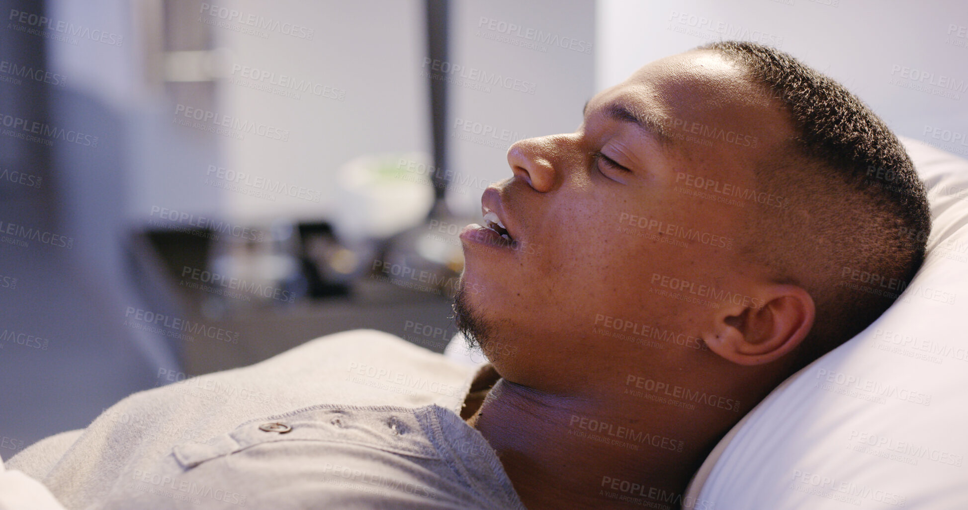 Buy stock photo Black man, sleeping and tired in home on bed for relax, comfortable and rest with peace on weekend.  Male person, fatigue and exhausted in apartment for break, nap and dream with lazy, cozy and calm