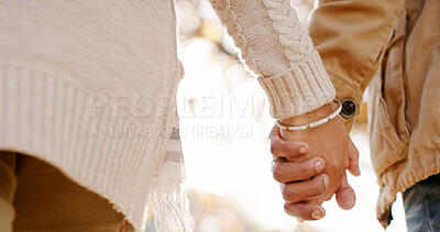 Buy stock photo Closeup, outdoor and couple with love, holding hands and bonding together with romance. Park, marriage and people with adventure, relationship or care with trust, support and travel with hope or calm