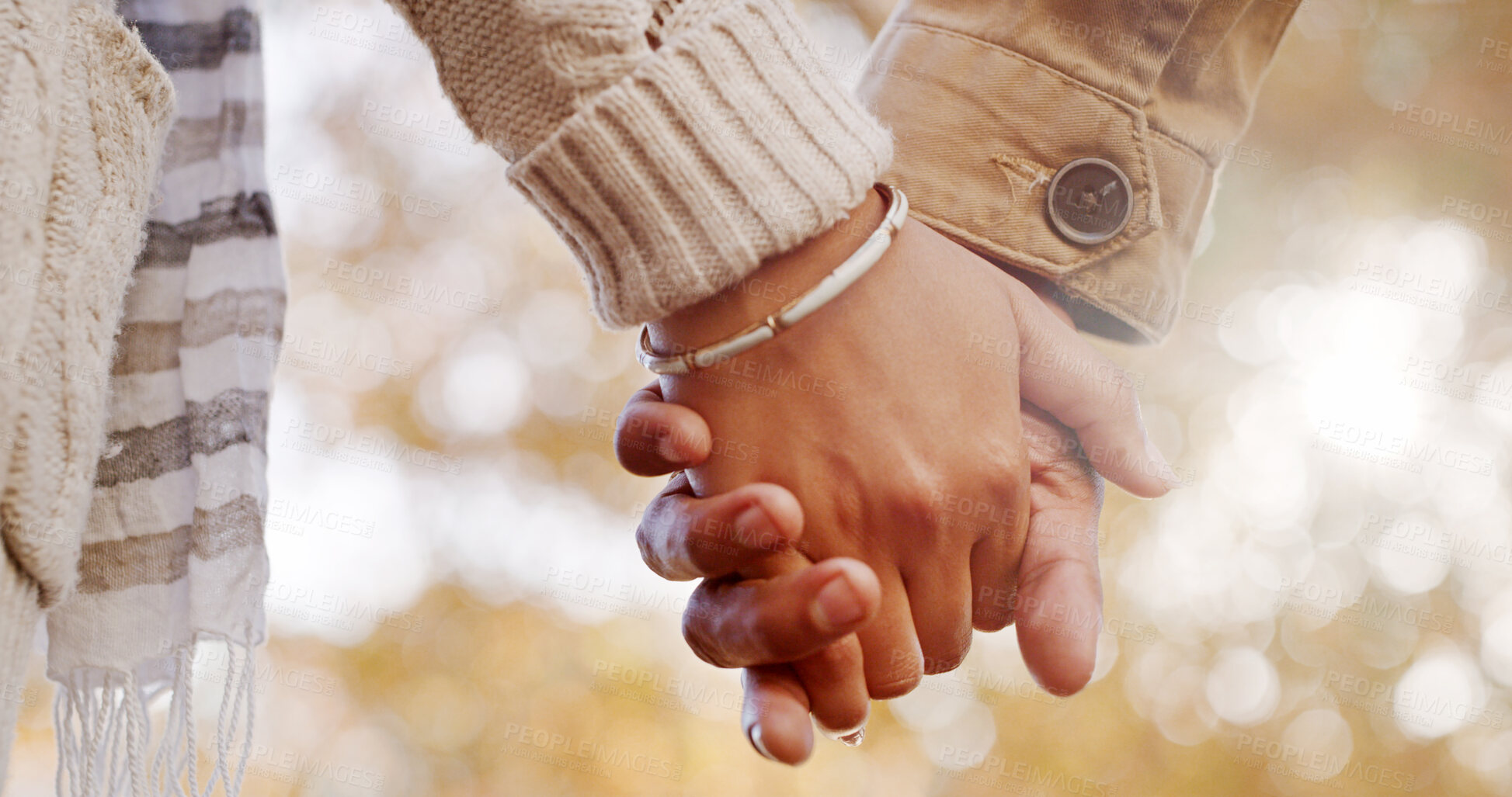 Buy stock photo Closeup, nature and couple with love, holding hands and bonding together with romance. Park, marriage and people with hope, relationship and care with trust, support and travel with commitment