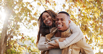 Buy stock photo Piggy back, love and black couple in park, smile and romance with relationship, marriage and bonding together. Outdoor, man and woman with happiness, funny and humor with laughing, commitment and joy