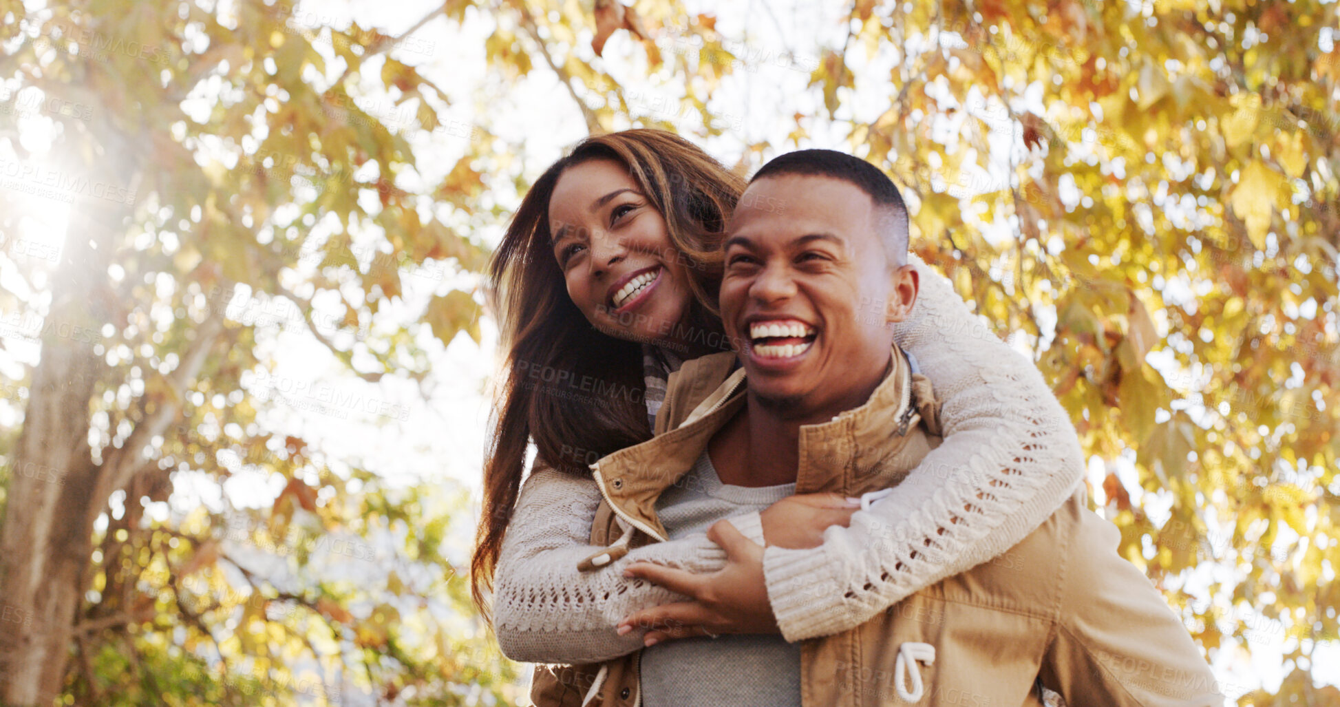 Buy stock photo Piggy back, love and black couple in park, smile and romance with relationship, marriage and bonding together. Outdoor, man and woman with happiness, funny and humor with laughing, commitment and joy