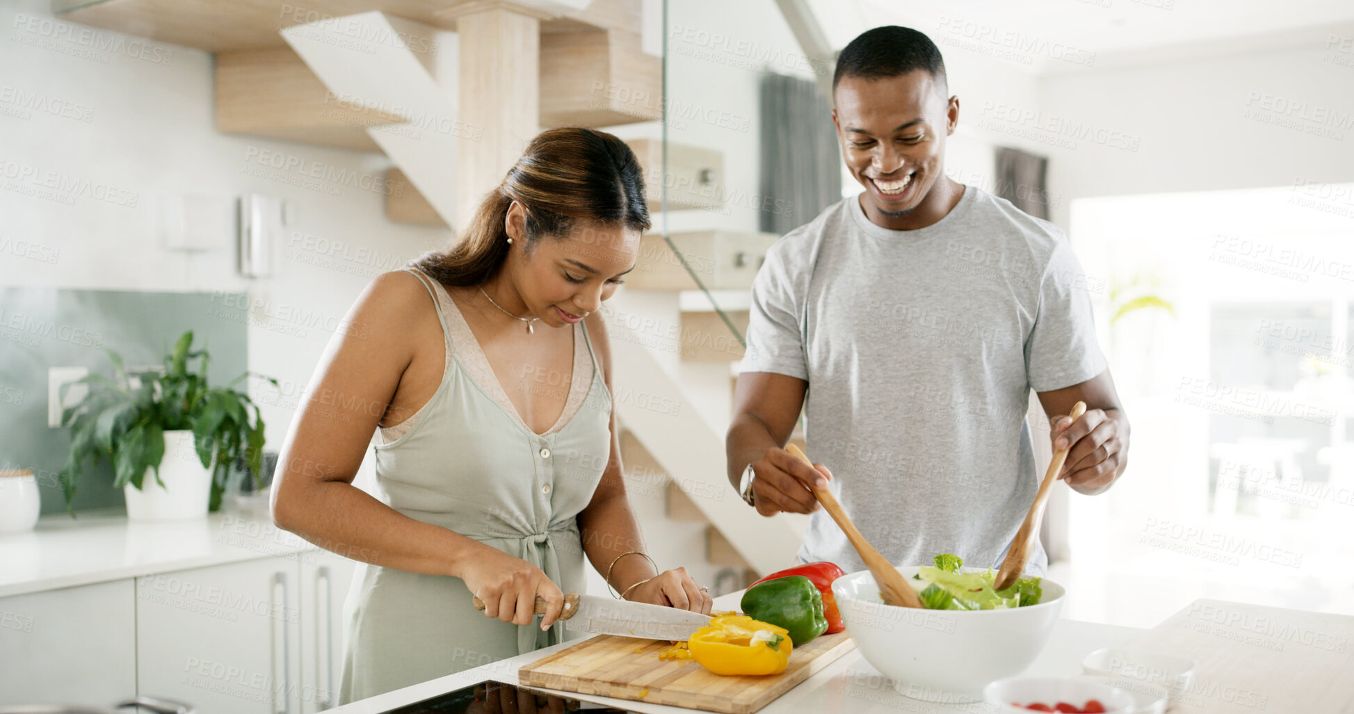 Buy stock photo African couple, smile and cooking in kitchen for bonding, dinner and relationship together with vegetables. People, happy and meal prep in home for love, support and brunch with food, diet and salad