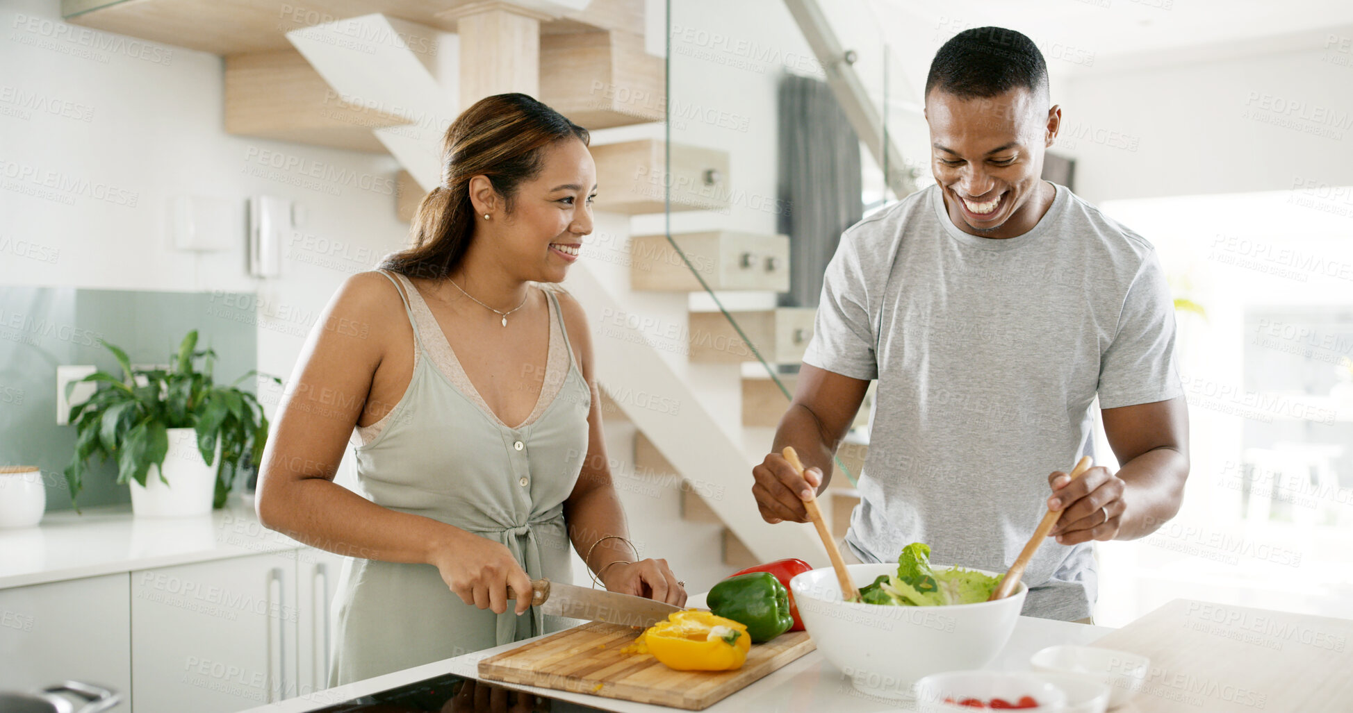 Buy stock photo African couple, happy and cooking in kitchen for bonding, dinner and relationship together with vegetables. People, smile and meal prep in home for love, support and brunch with food, diet and salad