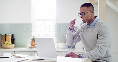 Buy stock photo Man, laptop and coffee in kitchen for remote work, planning or personal finance management. Entrepreneur, drinking tea or music in home for productivity, online banking or invoice payment in schedule