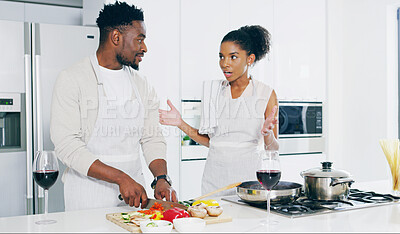 Buy stock photo African couple, cooking and talking in kitchen with vegetables, knife and question with nutrition in home. Black man, woman and meal prep with food, diet and discussion with ingredients at apartment