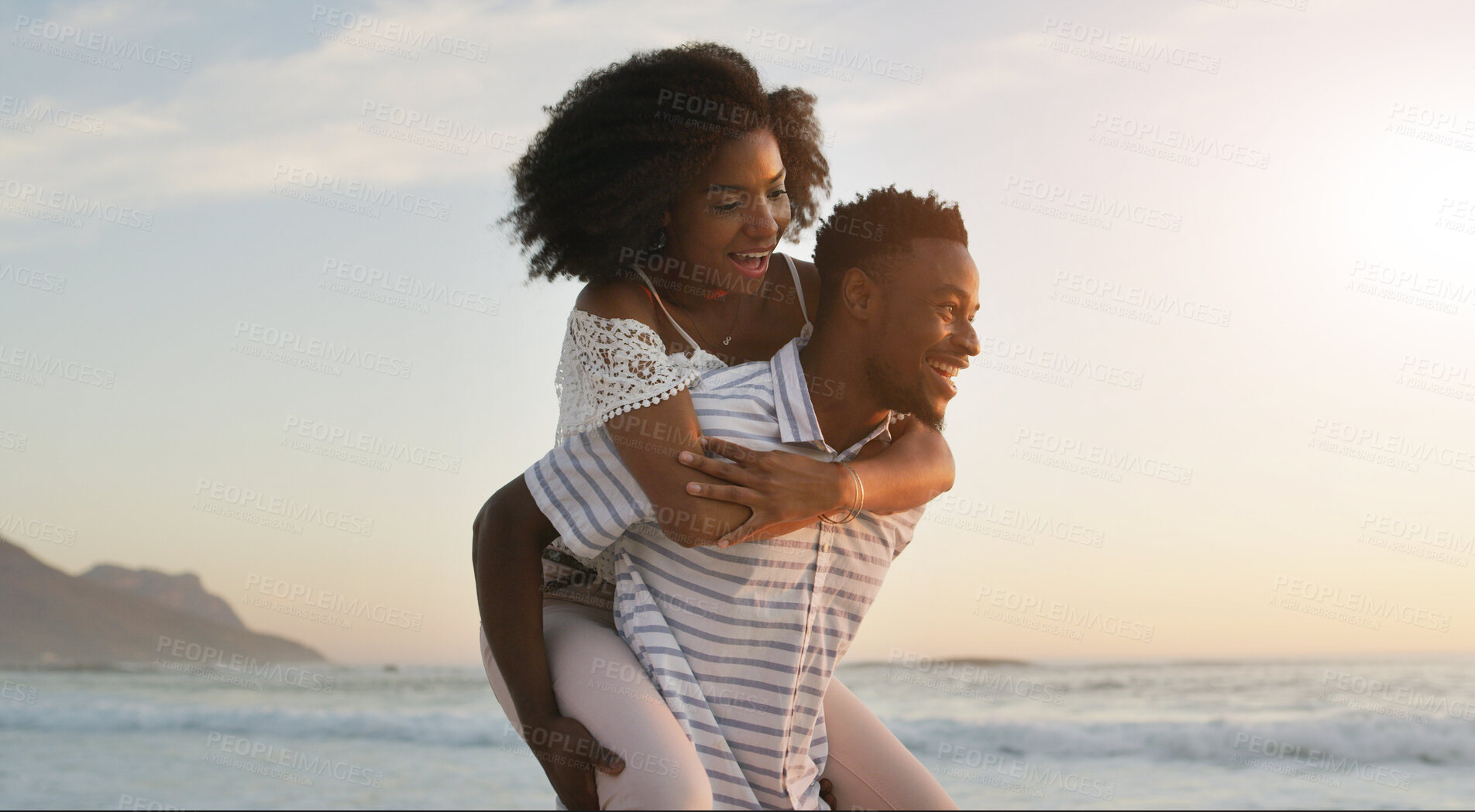 Buy stock photo Beach, couple and happy with piggyback on holiday for romance, date and bonding in Mauritius. Ocean, African people and smile in relationship on vacation or break for support, care and valentines day