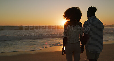 Buy stock photo Couple, sunset and holding hands at beach for love, holiday and travel together with back, care or trust. Man, woman and bonding by ocean for vacation, romance or connection with relationship on date