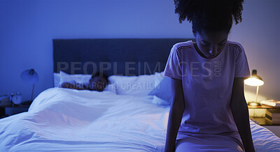 Buy stock photo Sad, woman and bedroom with African couple, night and marriage problem from infertility with stress and fight. Bed, sitting and thinking of divorce and relationship conflict in home with insomnia