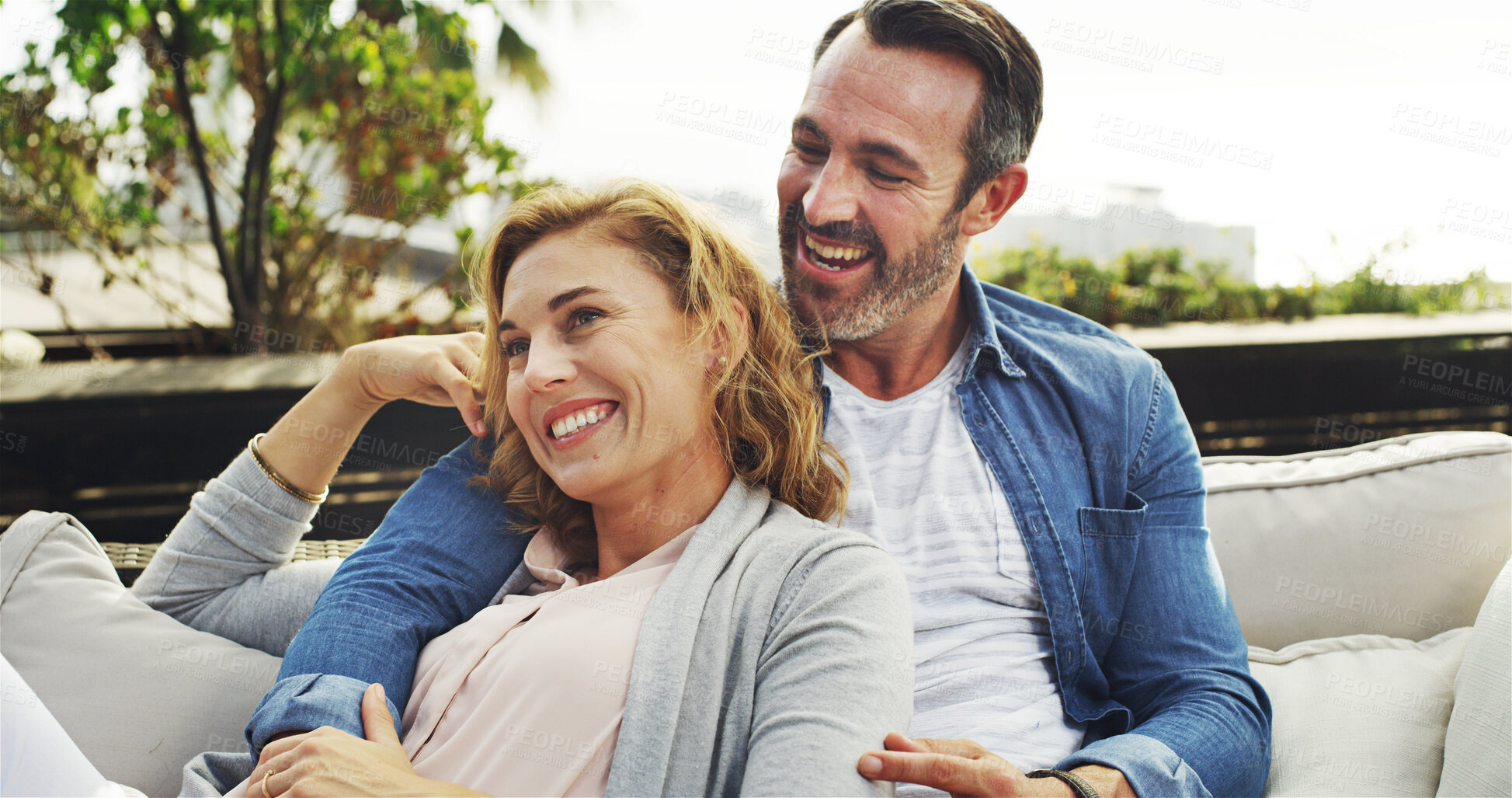 Buy stock photo Happy couple, outdoor and hug on holiday for travel, vacation and anniversary trip in hotel. Marriage, together and people with smile, bonding and romantic getaway for embrace, relax and relationship