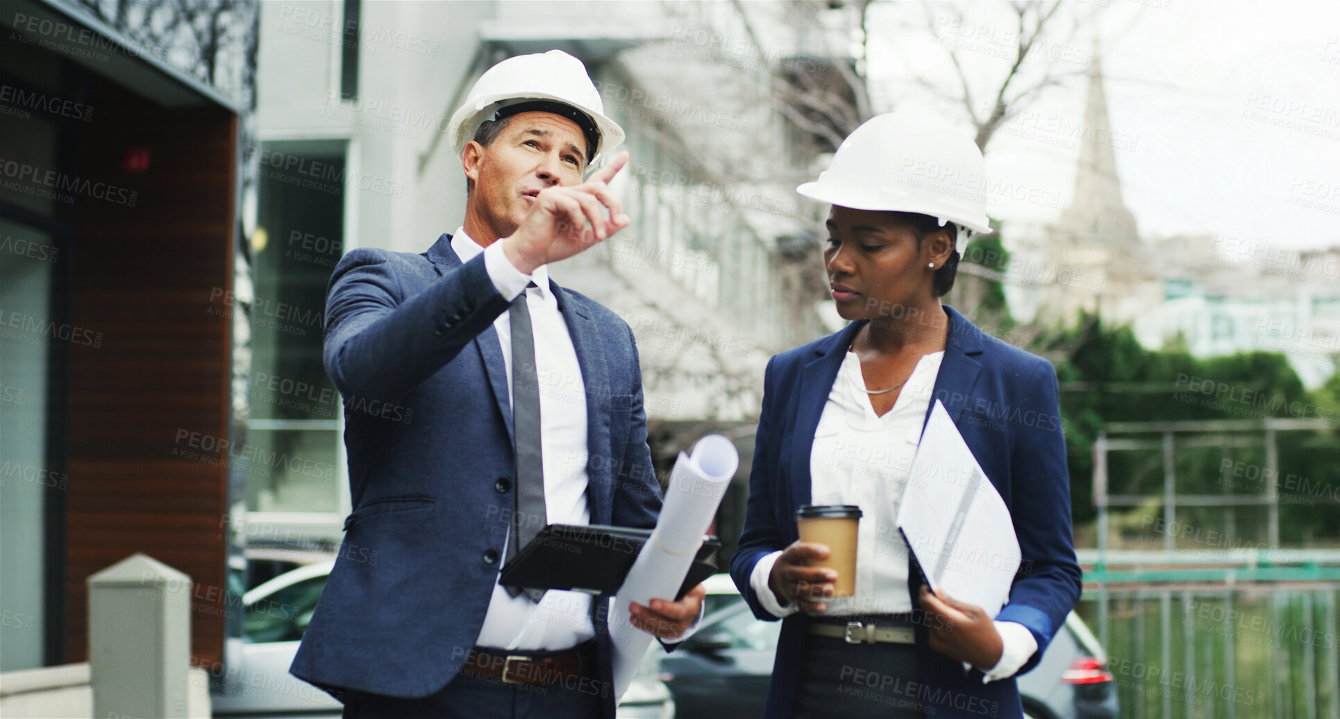 Buy stock photo Engineering, people and tablet in city for planning, urban development and project management. Architecture team, discussion and pointing with tech for inspection, contractor feedback and business