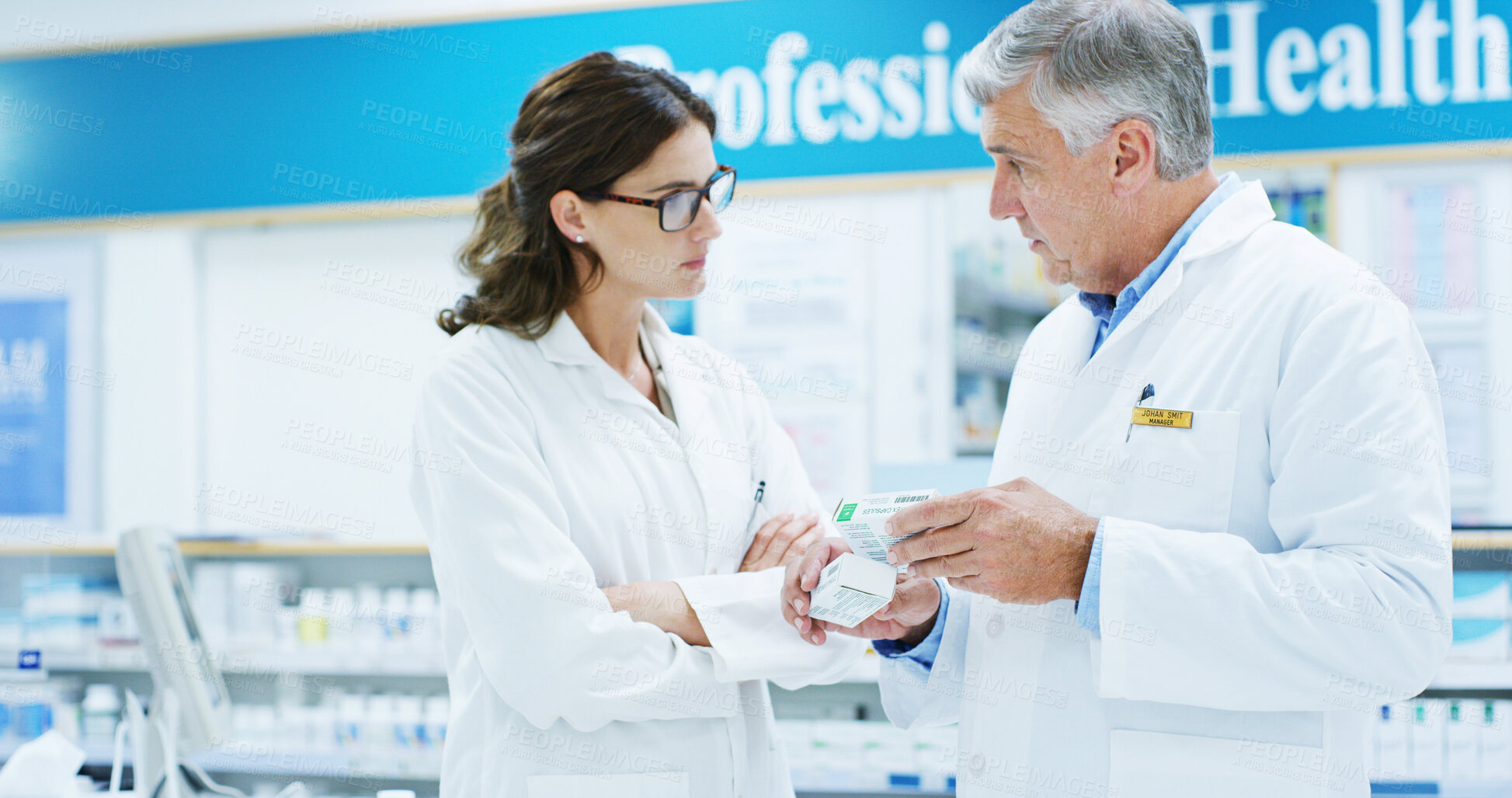 Buy stock photo Box, collaboration and information with people in pharmacy together for medical training. Conversation, healthcare mentor or prescription with pharmacist man and woman in clinic for retail wellness