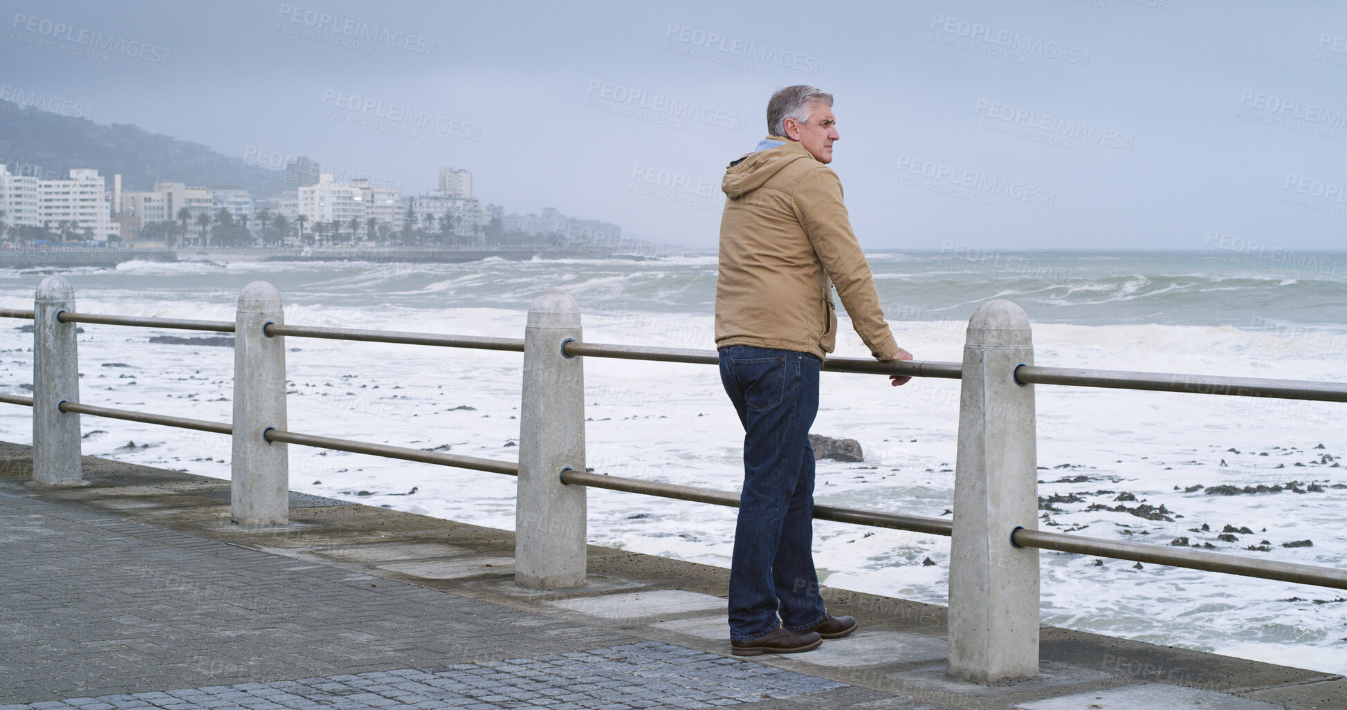 Buy stock photo Promenade, sea and thinking with mature man outdoor for calm, peace or view of ocean and waves. Idea, retirement and planning with senior person on boardwalk for quiet, vision or wellness in morning