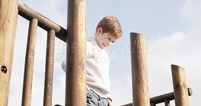 Buy stock photo Happy, child and monkey bars at playground outdoor with equipment, adventure and playful exercise. Smile, boy and fun games with motor growth, balance safety and gym support for childhood activity 