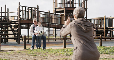 Buy stock photo Grandparents, grandchild and photography for bonding together in park, outdoor and playground. Senior people, boy and weekend for memory, care and vacation on holiday in winter with family or support