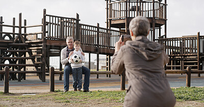 Buy stock photo Grandparents, grandchild and photography for memory in park, outdoor and playground as family. Senior people, boy and weekend for bonding together, care and vacation on holiday in winter with support