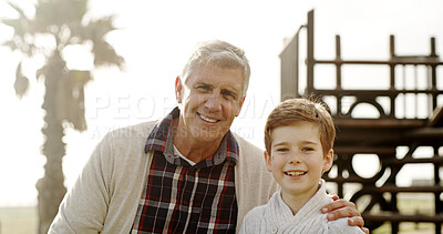 Buy stock photo Outdoor, senior man and smile with boy on portrait for fun, recreation and games in England. Park, people and grandfather with kid or grandson for bonding, care and support for child development