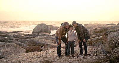 Buy stock photo Happy, ocean and grandparents with child explore for bonding, fun weekend and relax together at beach. Nature, family and young boy, grandpa and grandma on holiday, adventure and vacation together