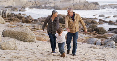 Buy stock photo Holding hands, beach and kid with grandparents running  for bonding, fun weekend and playing together. Nature, family and young boy, grandpa and grandma on holiday, adventure and vacation together