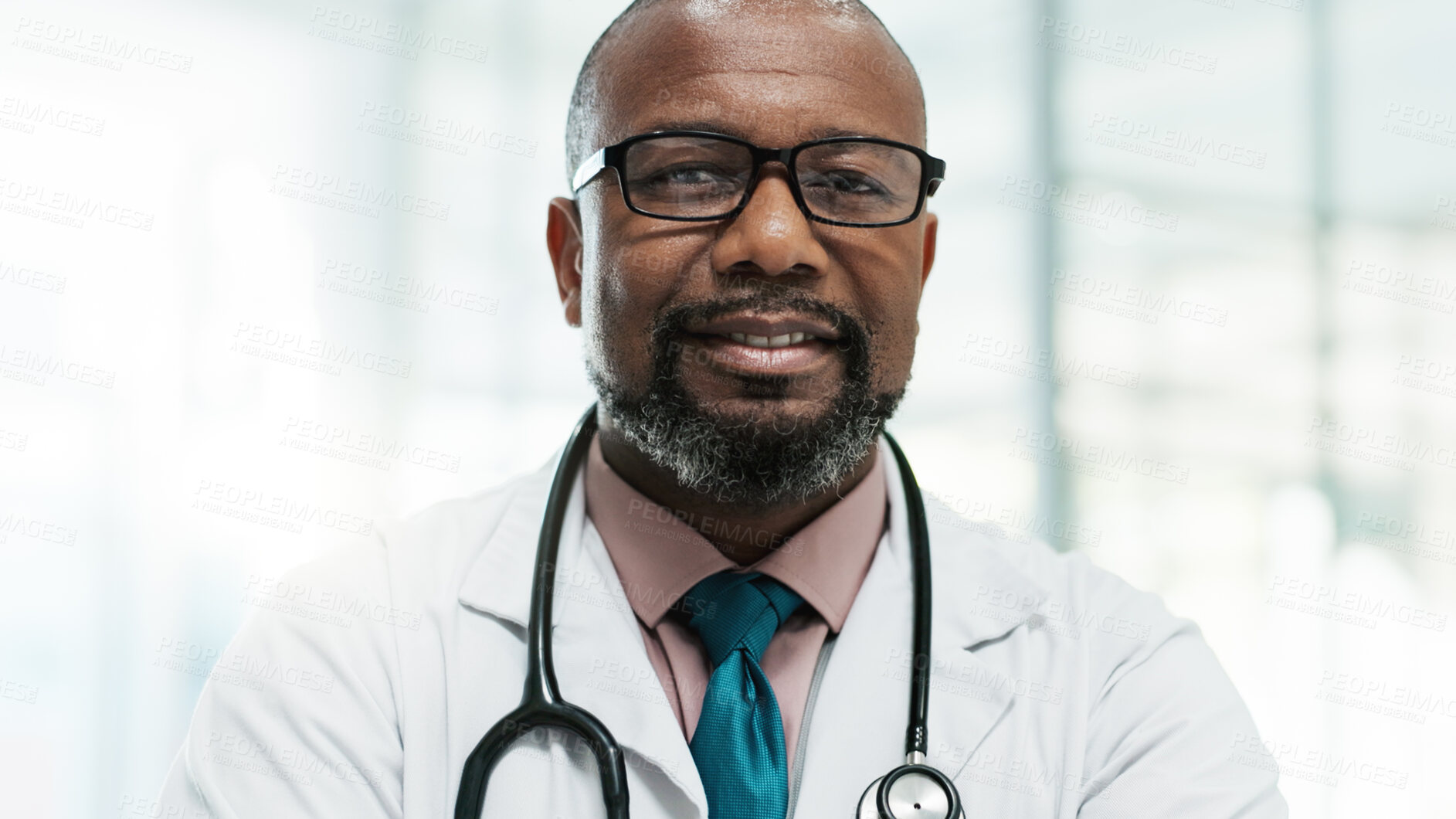 Buy stock photo Portrait, black man and mature doctor in hospital for healthcare service, wellness and job. Face, medical professional and confident cardiologist or physician working in clinic with glasses in Ghana