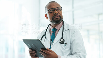 Buy stock photo Black man, doctor and tablet for thinking in hospital with medical research, Telehealth and surgery schedule. Male surgeon, healthcare and digital of history report, patient information and diagnosis