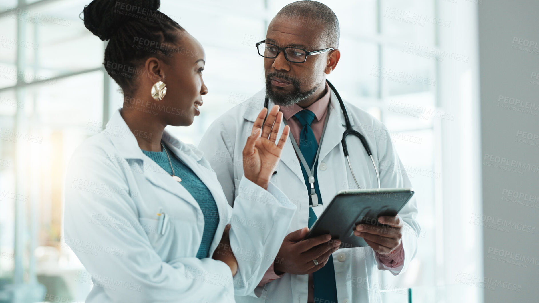 Buy stock photo Black people, doctors and discussion with tablet at clinic for telehealth, schedule and appointment. Hospital, employees and medical team on meeting for patient data, results and report in healthcare