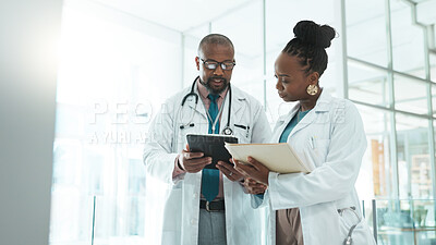 Buy stock photo Black people, doctors and folder on meeting with tablet at clinic for telehealth, schedule and appointment. Hospital, employees and healthcare team for patient data, results and report on discussion