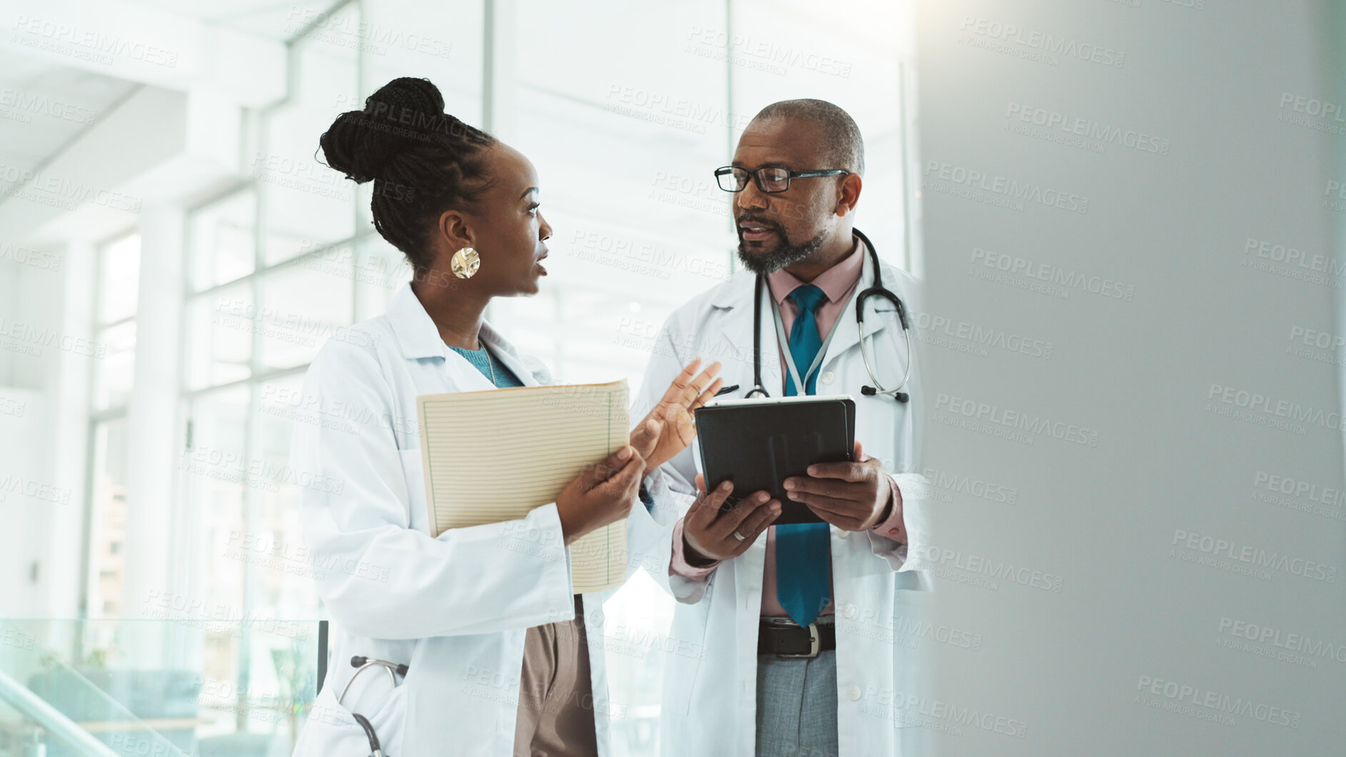 Buy stock photo Black people, doctors and folder on discussion with tablet at clinic for telehealth, schedule and appointment. Hospital, employees and healthcare team for patient data, results and report on meeting