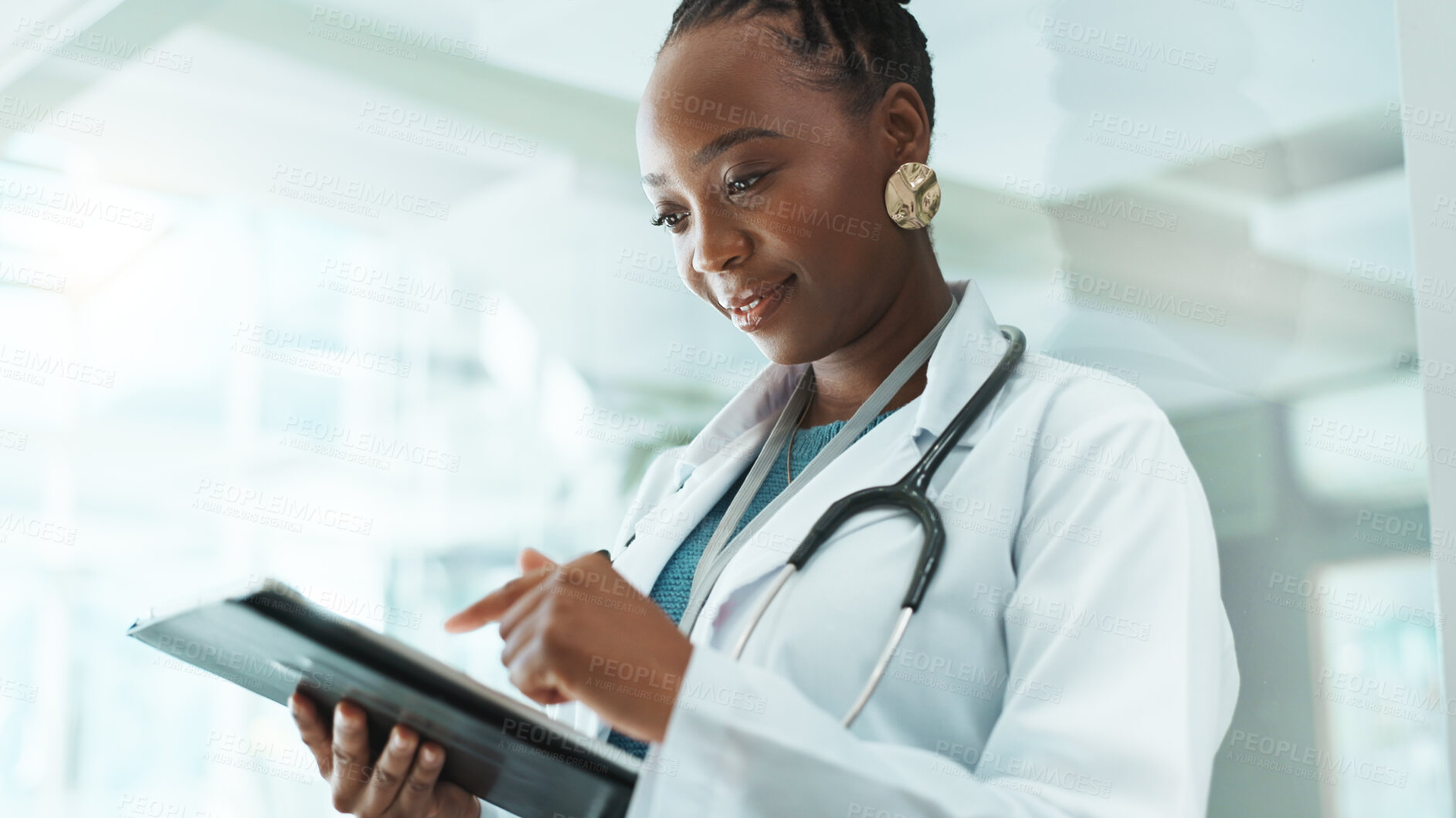 Buy stock photo Black woman, doctor and smile with tablet at hospital for patient data, medical records and report. Female person, employee and happy on internet at clinic for telehealth with appointment or schedule