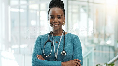 Buy stock photo Black woman, doctor and smile with arms crossed at clinic on portrait with pride for healthcare in Uganda. Female person, employee and medical professional with confidence or happy for medicine