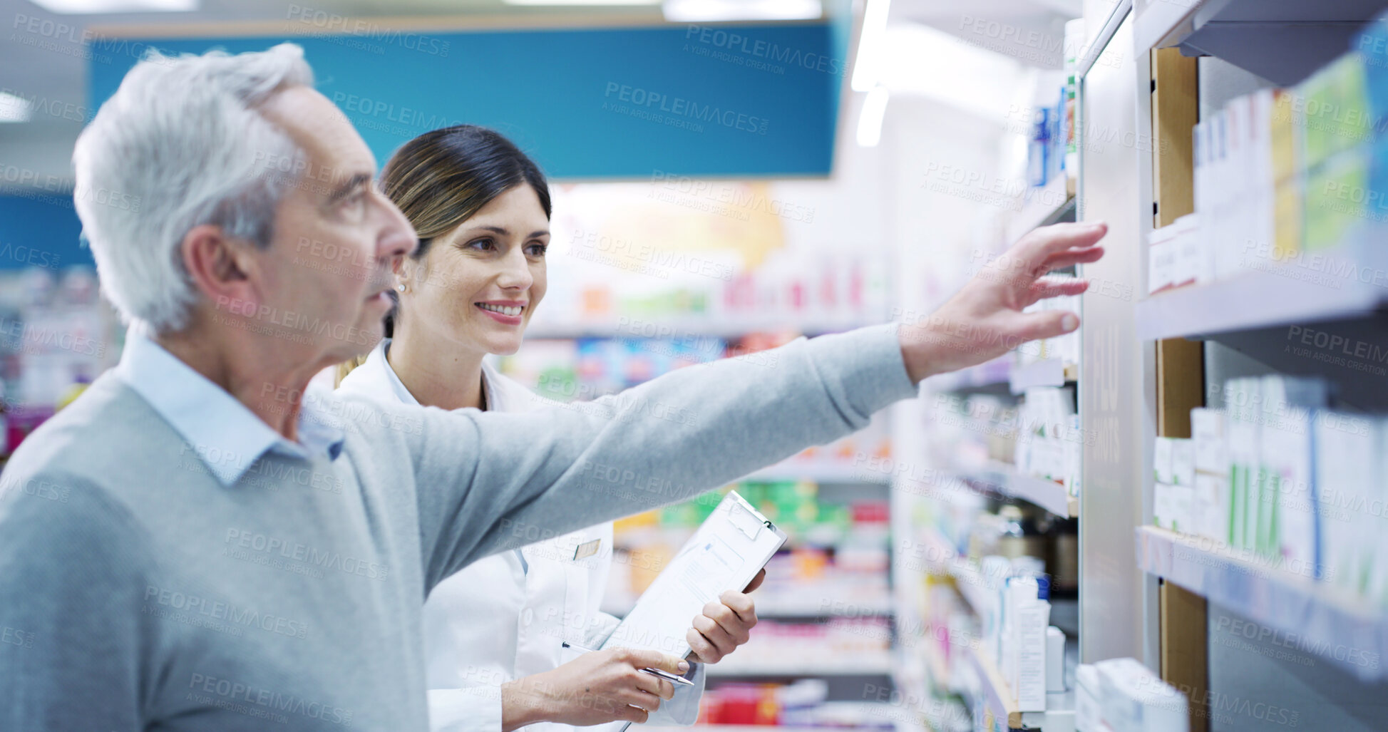 Buy stock photo Elderly man, pharmacist and help in pharmacy for medicine, choosing and advice for supplement choice. Senior person, woman and customer service at shelf for pharmaceutical, decision or expert opinion