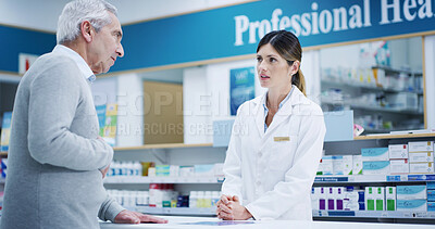 Buy stock photo Pharmacist, medicine and consultation with senior customer for stomach problem, advice or pain in retail store. Medical pharmacy, woman and talk to man with diarrhea, constipation or gut healthcare