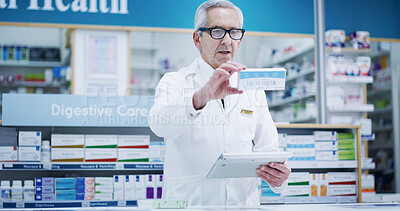 Buy stock photo Mature, pharmacist and man with drugs on tablet for inventory check, online order and pills dispensary. Medical, professional and medication box in pharmacy store for pharmaceutical stock checklist