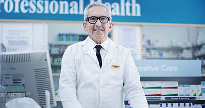 Buy stock photo Computer, pharmacy and portrait of mature man in dispensary for cure, treatment or vitamins. Counter, healthcare and medical with smile of professional pharmacist person in hospital or clinic