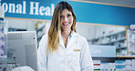 Computer, portrait and smile with woman in pharmacy to dispense medicine for cure or treatment. Checkout, healhcare and medical with happy pharmacist person at work for sale of pharmaceuticals