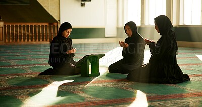 Buy stock photo Muslim women, mosque or praying to worship for Palestine, gratitude or support to Allah in holy temple. Dua, Islamic and spiritual people kneeling for God on Ramadan Kareem in Saudi Arabia together