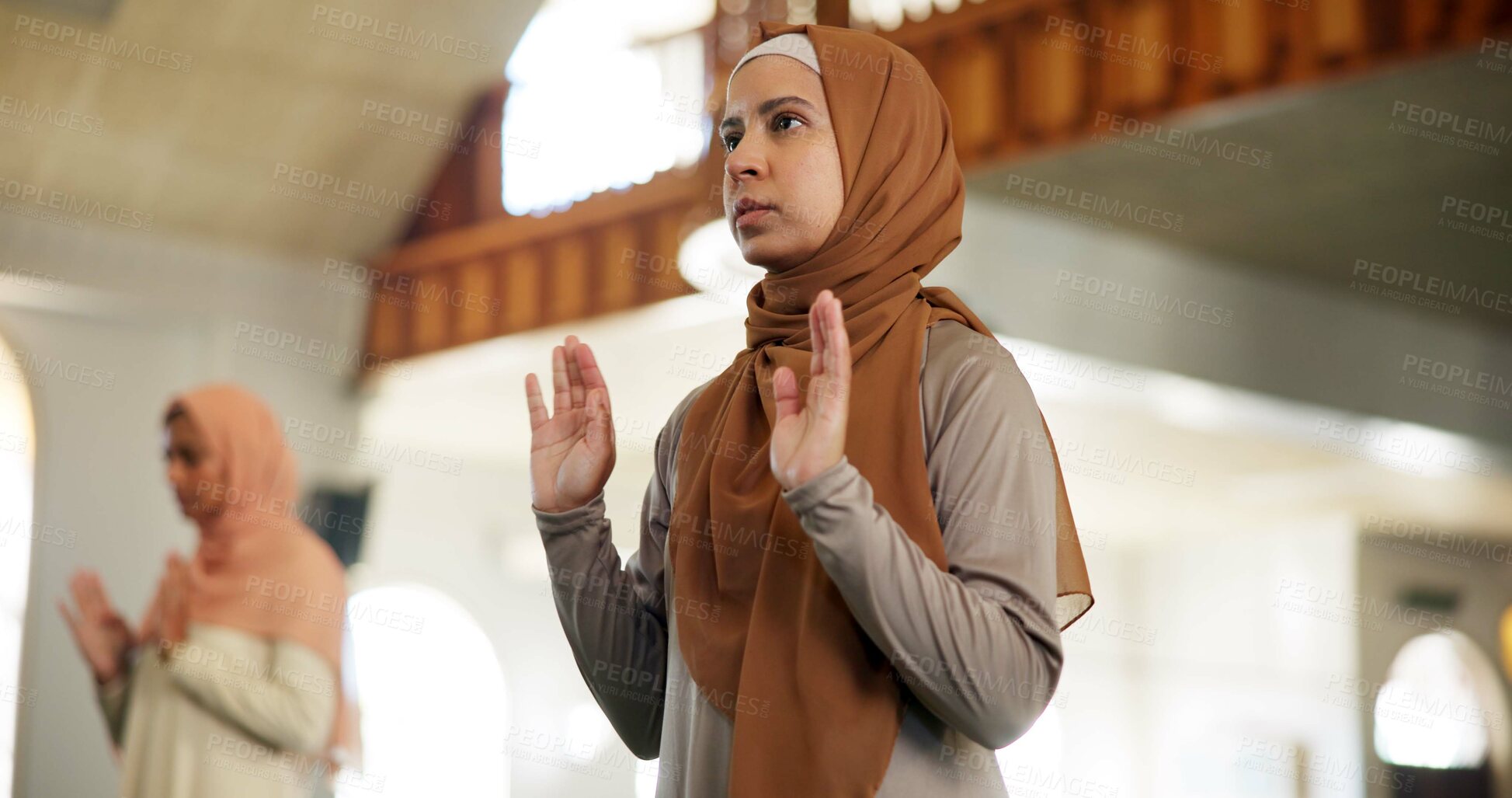 Buy stock photo Hijab, muslim and prayer with woman in mosque to praise or worship Allah for ramadan. Haji, Islam and religion with Arab person praying at temple for belief, culture or faith in Middle East
