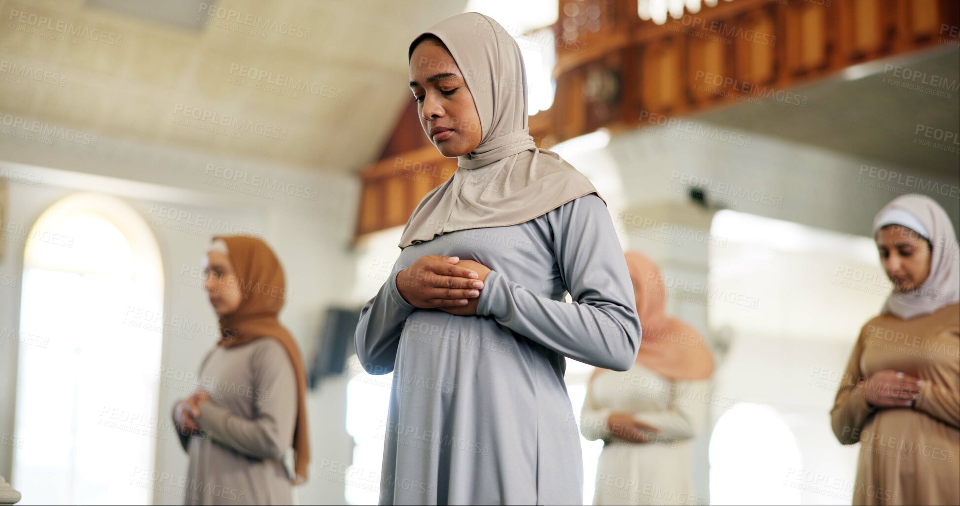 Buy stock photo Islam, prayer and religion with woman in mosque to praise or worship Allah for ramadan. Hajj, hijab and Muslim with Arabic person praying at temple for belief, culture or faith in Middle East