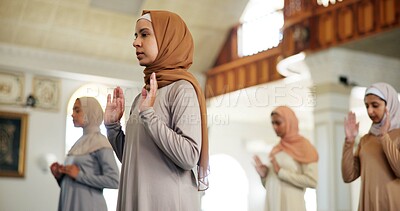 Buy stock photo Islam, praying and religion with woman in mosque to praise or worship Allah for ramadan. Hajj, hijab and Muslim with Arabic person in prayer at Middle East temple for belief, culture or faith