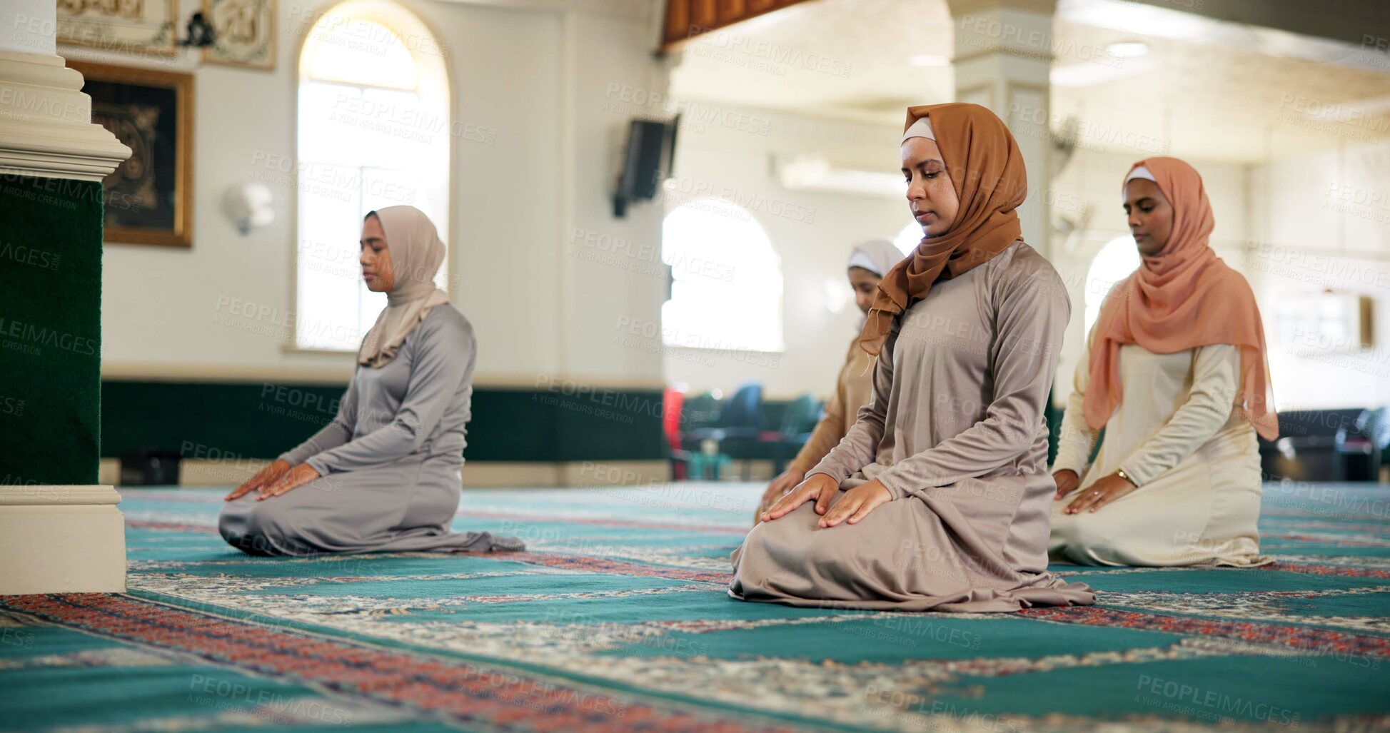Buy stock photo Muslim, knee or women in mosque to worship for Palestine, gratitude and support to Allah on holy carpet. Dua, community or Islamic people praying to God for faith and peace on Ramadan Kareem together