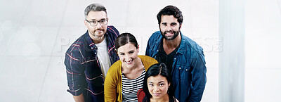 Buy stock photo High angle shot of a group of creatives standing together in an office