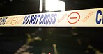 Crime scene, police tape and danger in building for investigation with safety warning, caution or evidence. Forensic inspection, barrier sign and no entry in abandoned garage for emergency or closeup