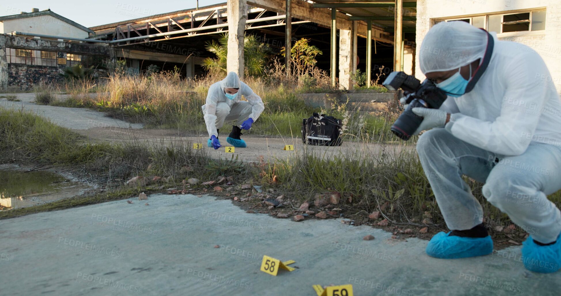 Buy stock photo Crime scene, team and photography outdoor for forensics, evidence and investigation. CSI people, hazmat suit and camera in field for inspection, observation and documenting proof at police markers